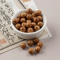 Natural 10mm round brown wood beads with grain for DIY jewelry and bracelets - 1 Piece Pack / Golden Sandalwood