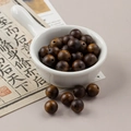 10mm dark sandalwood beads for DIY jewelry making shown in a white ceramic bowl - 1 Piece Pack / Dark Skin Wood