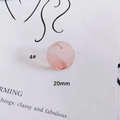 Macro shot of 20mm round pink translucent resin earring component accessory - 20mm / Pink