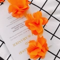 Detailed close-up of three bright orange layered chiffon 3D flowers for DIY garment accessories - Bright Orange (6#)