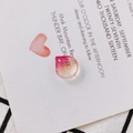 Teardrop glass bead with red and yellow gradient finish and Ontario text detail - Gradient Pink Yellow Water Drop With Text (11#)