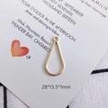 Macro shot of 28x13.5x1mm light gold water drop hollow metal pendant for DIY jewelry - Hollow Teardrop Style (1#)