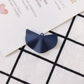 Detail shot of a dark blue matte pleated fan-shaped charm for DIY earring and necklace design - Dark Blue