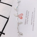 Polished silver alloy chain bracelet featuring delicate hollow leaf charms on a white card - Hollow Leaf Style (1# Silver)