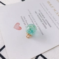 Pastel blue glass bead pendant with embedded white dried flowers and gold metal cap - Light Blue (14#)