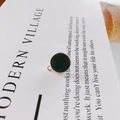 Macro shot of dark green enamel circle pendant with gold beaded trim for jewelry making - Dark Green