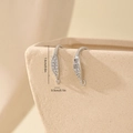 Close-up of silver-plated ear hooks featuring clear cubic zirconia pavé detailing - Pave Row Arc Style (MYYX00591)