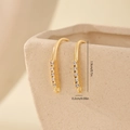 Macro view of gold-plated jewelry earring hook connector with 5 clear cubic zirconia gems - Gold 5-Stone Vertical Row Style (MYYX00577)