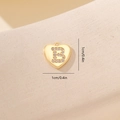 Macro view of 1cm gold heart pendant with letter B zircon inlay for DIY jewelry - Letter B-Gold