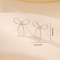 Detailed size view of silver bow-shaped earrings measuring 1.8cm by 2.0cm for women - Platinum Rounded Bowknot Style (MYLHD00004)