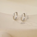 Detail shot of silver hinged hoop earrings with dimensions showing 1.5cm diameter - 1.5cm Polished Round Style (Platinum E071239-3bkb)