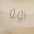 Detail of silver round hoop earrings with polished metal texture and dimensions on stand - 1.8cm Polished Round Style (Platinum E071229-4bkb)