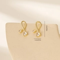 Detail showing the 2cm by 1.2cm size measurements of gold leaf earrings with zircons - Gold (MYYX00617(e-C26))