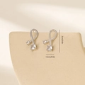 Detailed view of silver twisted hoop earrings with zircon stones and dimension labels - Platinum (MYYX00617(e-C26))