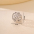 Macro view of silver spacer bead with zircon inlay showing dimensions 1.4cm by 1.0cm - 1PCS / Hollow Spherical Spacer Bead (MYYX00445) / White Gold