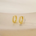 Close-up of golden huggie earrings with dimensions 1.3cm diameter and 0.2cm width - One Pair / Gold (E071239-2k4)
