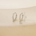 Macro view of 1.4cm polished silver metal earring hoops with DIY hanging loops - Hanging Loop Huggie (E071238bkb) / Platinum (E071238bkb)