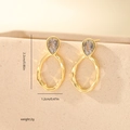 Detail of gold-plated drop earrings with clear zircon and dimensions 2.2cm by 1.2cm - Gold (MYYX00702)