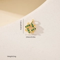 Detail view of 1.2cm gold star pendant with emerald green zircons and twisted rope texture - Hexagonal Petal Green Stone Style (MYXF0586)