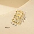 Detail view of a square gold skull pendant with white rhinestones and size dimensions - Gold / Square Skull Style (MYPJ61074)