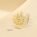 Detailed macro view of a gold daisy pendant with zircon inlay showing 1cm dimensions - Gold Daisy Shape Pendant (MYPJ61135)