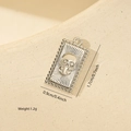 Detailed view of rectangle skull pendant with dimensions 1.7cm x 0.9cm and 1.2g weight - White Gold / Square Skull Style (MYPJ61074)