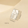 Detailed macro view of silver postcard pendant with I Love You engraving and heart - White Gold / Creative Postcard Style (MYPJ61437)