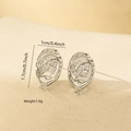 Macro view of vintage silver metal earrings with embossed portrait detail for DIY jewelry - Irregular Oval Figure Relief Style (MYED34078) / White Gold