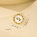 Macro view of gold round pendant with sliding zircon and white shell inlay detail - Nested Round Pendant (XF0425) / Gold Edge White