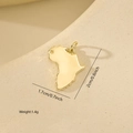 Macro shot of 18k gold plated Africa map pendant with dimensions 1.7cm x 2.0cm - Africa Map Style (XF0508) / Gold