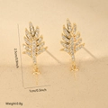 Detailed view of leaf-shaped gold copper charms with zircon stones and size measurements - One Pair / Gold (MYWX22089)