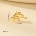Makro-Detail eines 1,7 cm vergoldeten Stegosaurus-Anhängers mit Größen- und Gewichtangaben - 1 Stück / Goldener Stegosaurus (MYPJ61161)