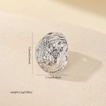 Detail view of shell pendant with dimensions 1.3cm x 1.1cm and silver spiral texture - White Gold (MYP15977)