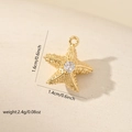 Macro shot of gold starfish pendant with cubic zirconia and size dimensions in inches - Zirconia Inlaid Gold Sea Star (Gold MYCBK3701(i-A2))