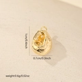 Detailed view of a gold-plated seashell charm with natural texture and size dimensions - Irregular Hollow Pendant (MYCBK3660) / Gold
