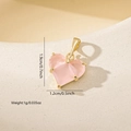 Detailed view of pink zircon heart pendant with dimensions 1.9cm height and 1.2cm width - Real Gold Pink