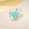 Detailed macro view showing the size dimensions of the light blue heart zircon pendant - Silver Blue