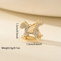 Macro view of a gold rocking horse pendant with clear zircons, size 1.3cm by 1.5cm - 1 Piece / Gold Rocking Horse (MYCBK3899)