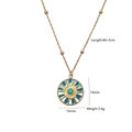 Macro view of gold-plated compass pendant with turquoise stone and dimension labels - Blue Enamel