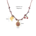 Detail view of handmade braided cord necklace with cactus and cherry charms, 45+5cm length - Cactus Cherry Woven Necklace (3)