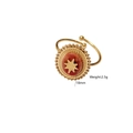 Detail of bohemian gold star ring with red natural stone inlay and 18mm face diameter - Rhodonite