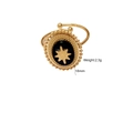 Detail of gold titanium steel ring with black enamel star motif and 18mm oval face - Black Agate