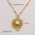 14K gold-plated stainless steel sunburst pendant necklace with central white stone inlay - White Mother of Pearl Necklace