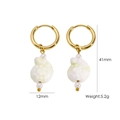 Detail view of ocean-style ceramic drop earrings with 41mm height and 5.2g weight specs - White and Green Spiral Shell Style (9)