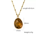 Detailed view of vintage gold necklace featuring oval tiger eye stone with size specifications - Yellow Tiger Eye Necklace