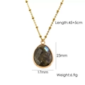 Detailed view of teardrop grey stone pendant with gold chain and size specifications - Labradorite Necklace