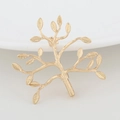 Macro detail of golden tree-shaped brooch with intricate branch and leaf textures - 36X39MM / Gold