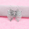 Elegant silver owl drop earrings with intricate cutout feather patterns for women - Platinum