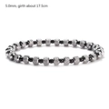Macro shot of 5mm black round beads and faceted silver metal beads on elastic bracelet - 5mm / Black and Silver Mix (YB900BLK)