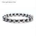 Detail view of 7mm black beads and silver textured metal beads on a stretchy bracelet - 7mm / Black and Silver Mix (YB900BLK)